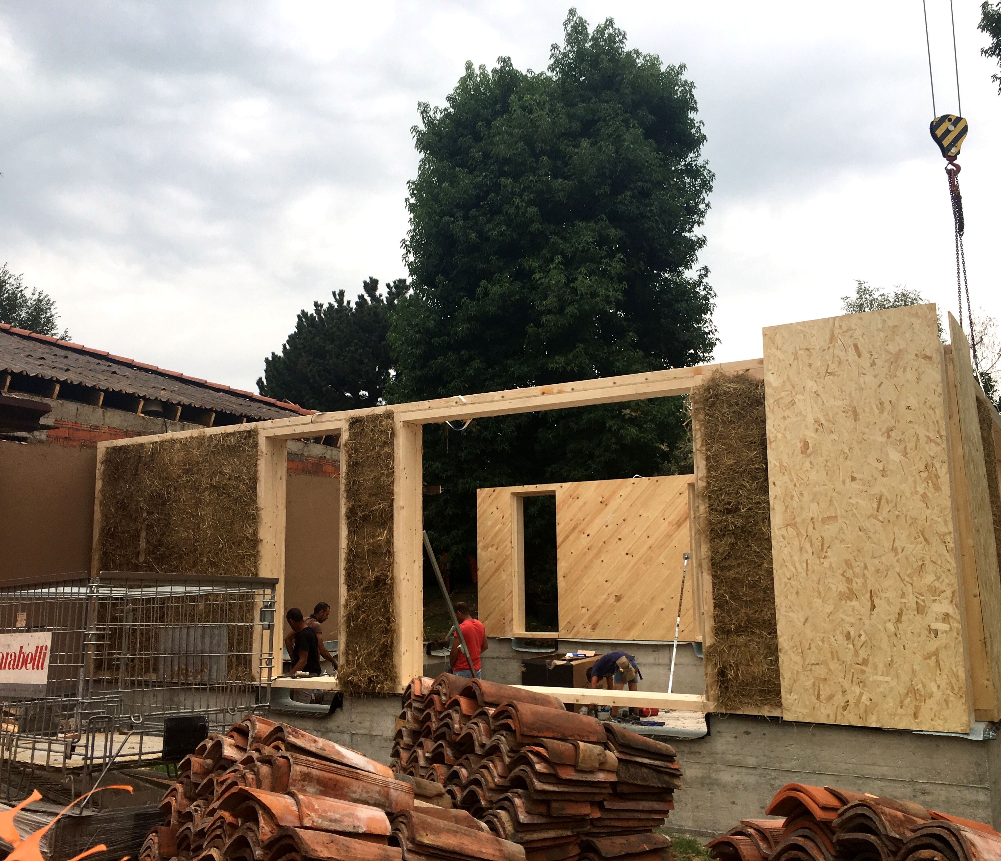 Building site: laying timber-framed perimeter walls