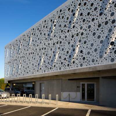 Exterior: perforated panels and floating by Gilles Bouchez