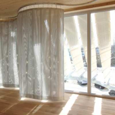 Soft House. Una facciata tessile dinamica, low-energy e in legno